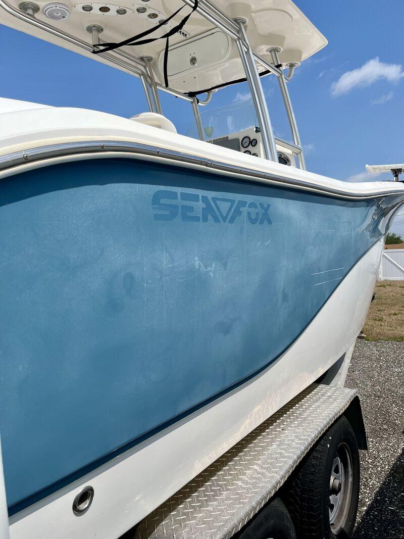 Light blue hull in hard Florida sun with no haze in the finish